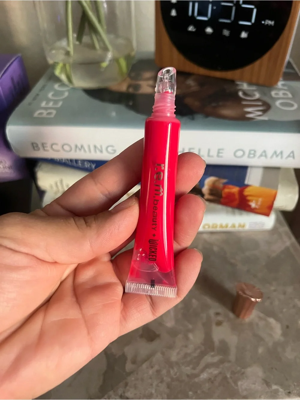 r.e.m. beauty x wicked: for good poppy plumping lip gloss
